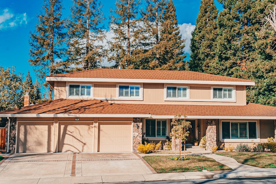 Charming two-story house with landscaped front yard and wide driveway